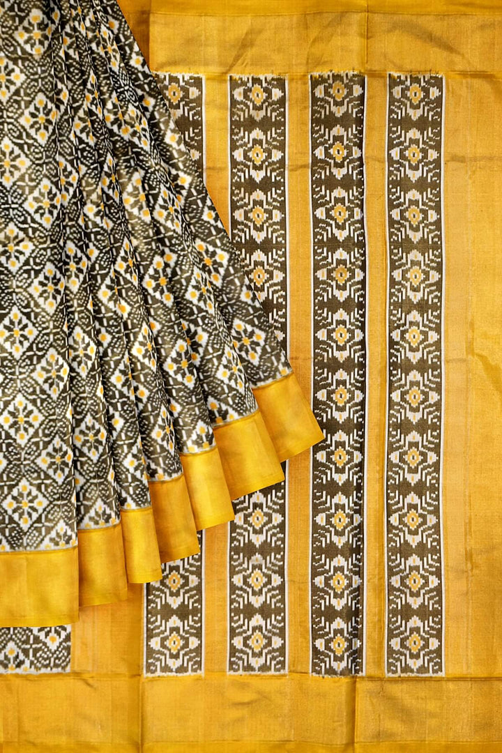 Ikkat  pure silk tissue saree in yellow & off white