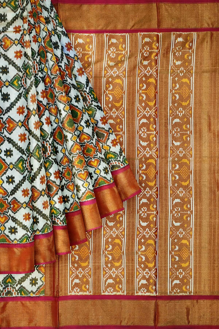 Ikkat silk tissue saree in off white