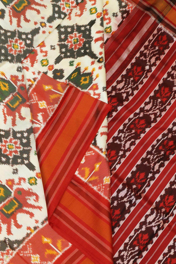 A twill weave ikkat pure silk saree in  off white