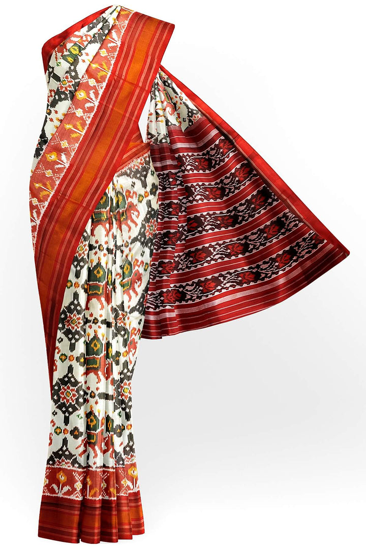 A twill weave ikkat pure silk saree in  off white
