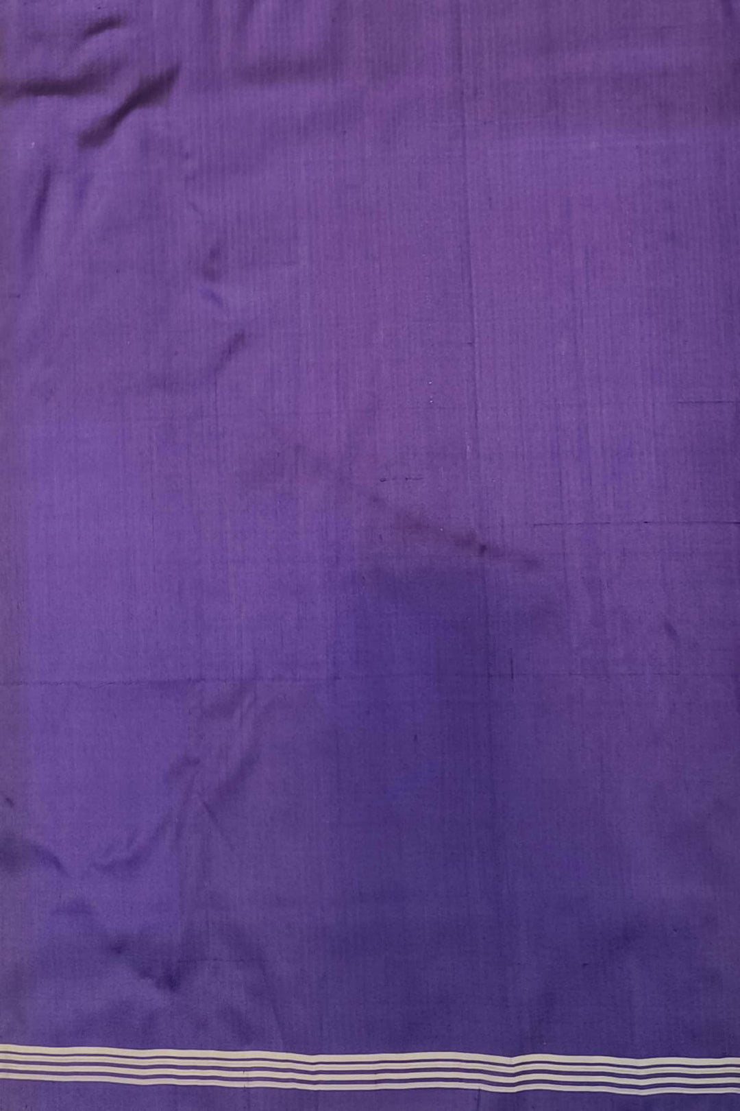 A twill weave ikkat pure silk saree in  white