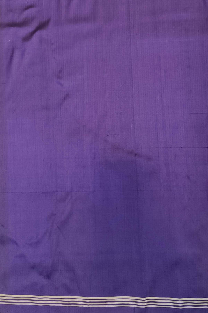 A twill weave ikkat pure silk saree in  white