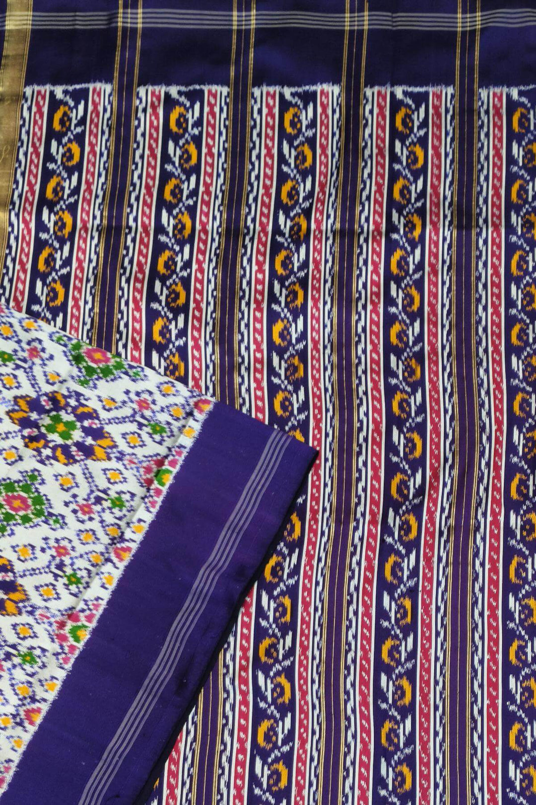 A twill weave ikkat pure silk saree in  white