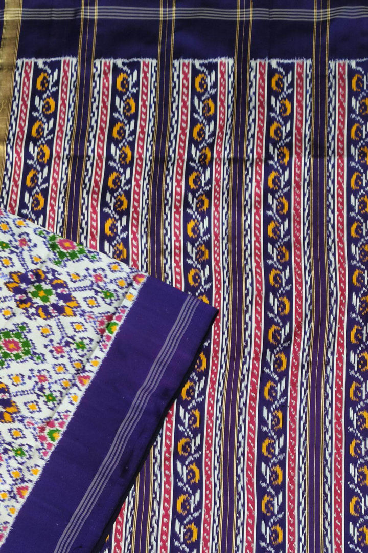 A twill weave ikkat pure silk saree in  white