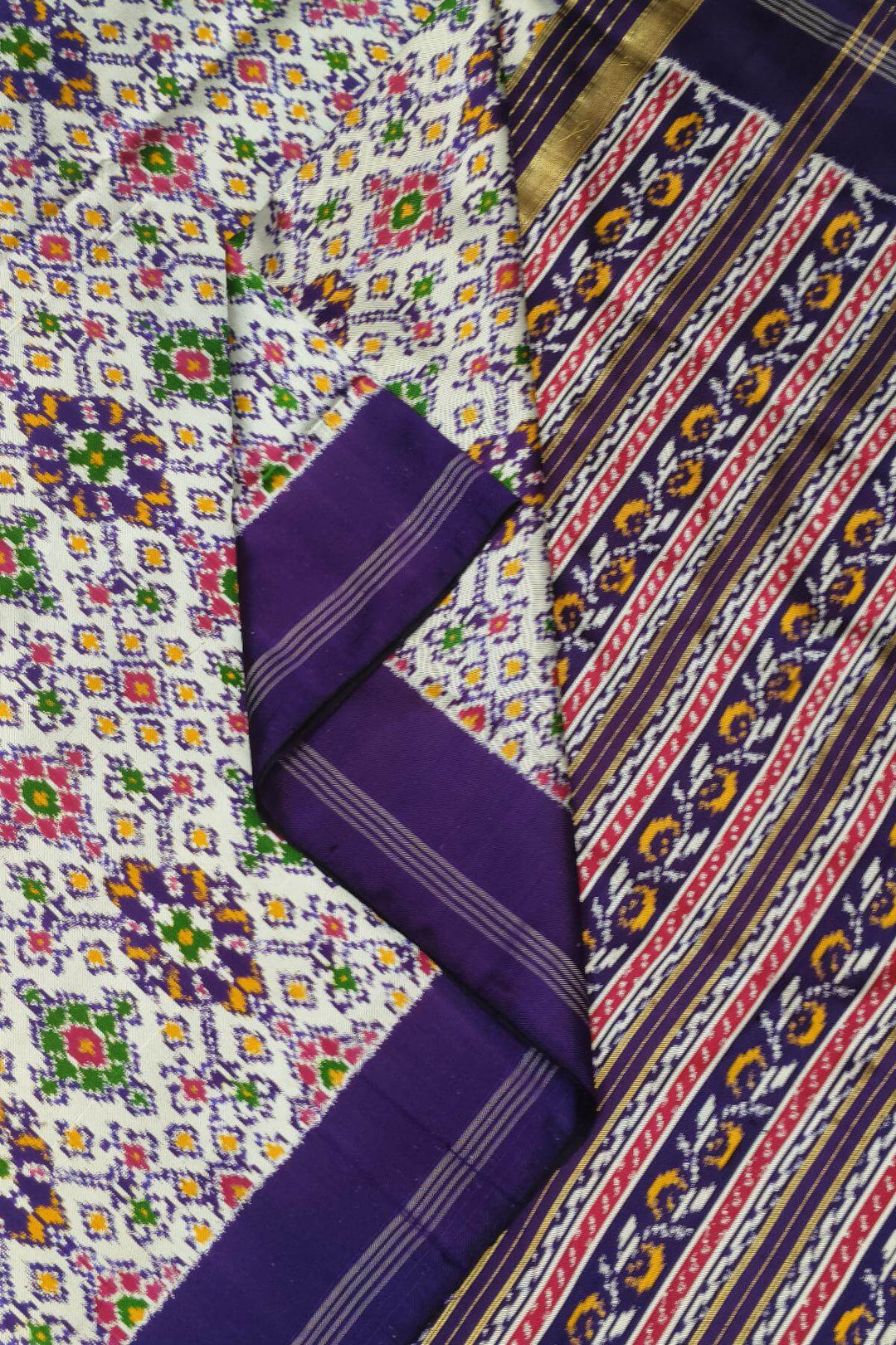 A twill weave ikkat pure silk saree in  white