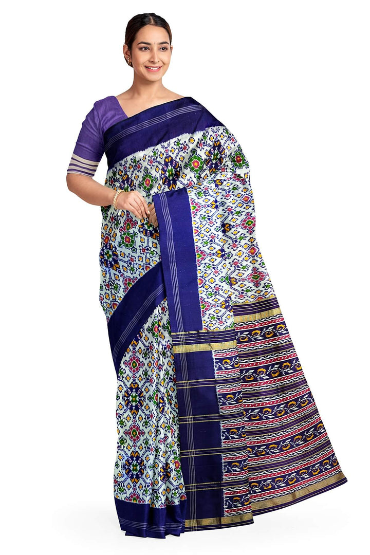 A twill weave ikkat pure silk saree in  white