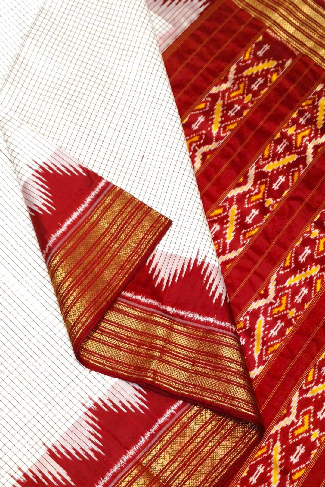 Handwoven Ikat pure silk saree in off white in  fine checks