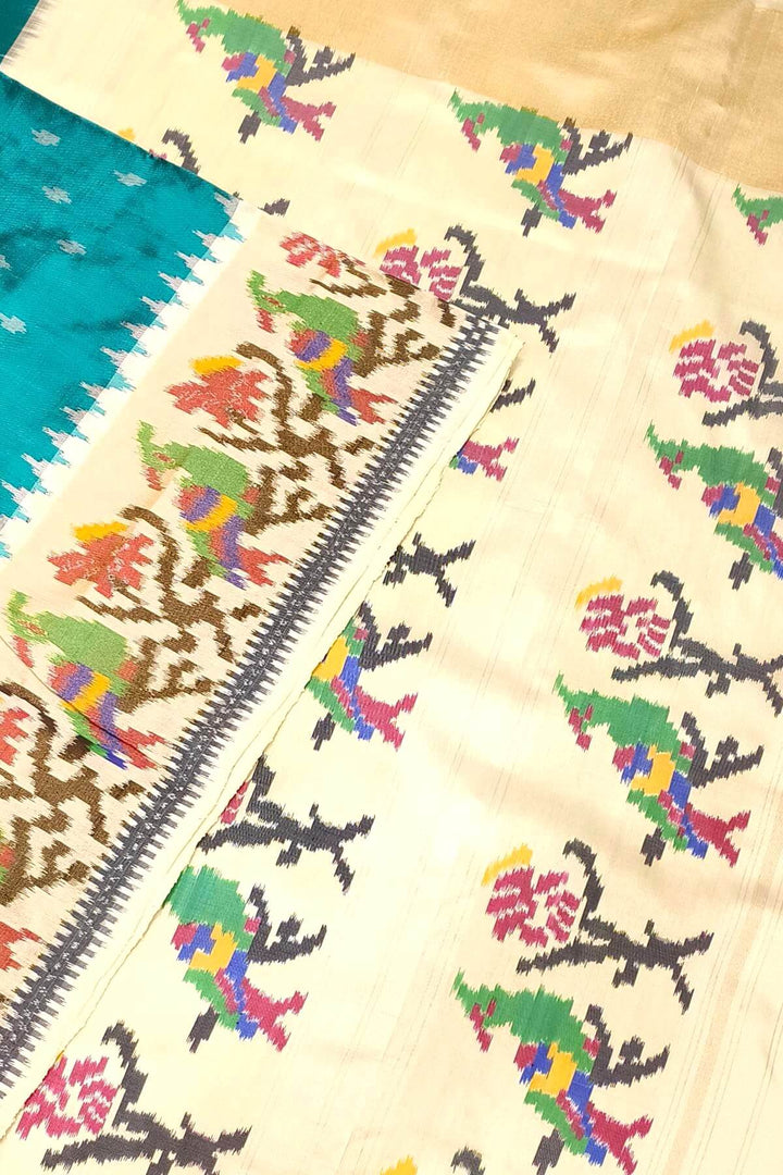 Handwoven Ikat pure silk saree in green with small motifs