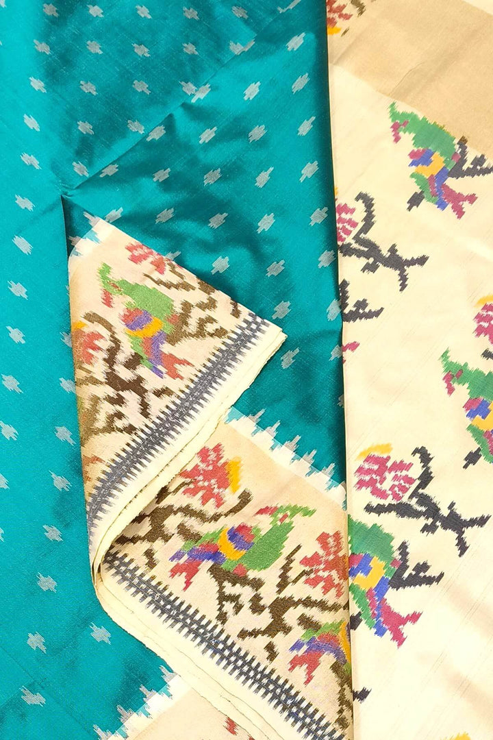 Handwoven Ikat pure silk saree in green with small motifs