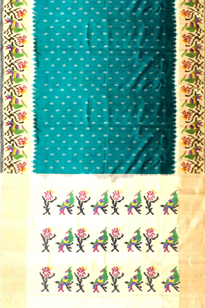 Handwoven Ikat pure silk saree in green with small motifs