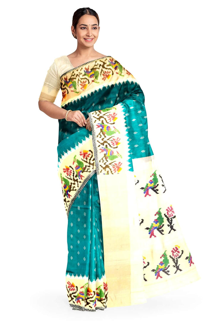 Handwoven Ikat pure silk saree in green with small motifs