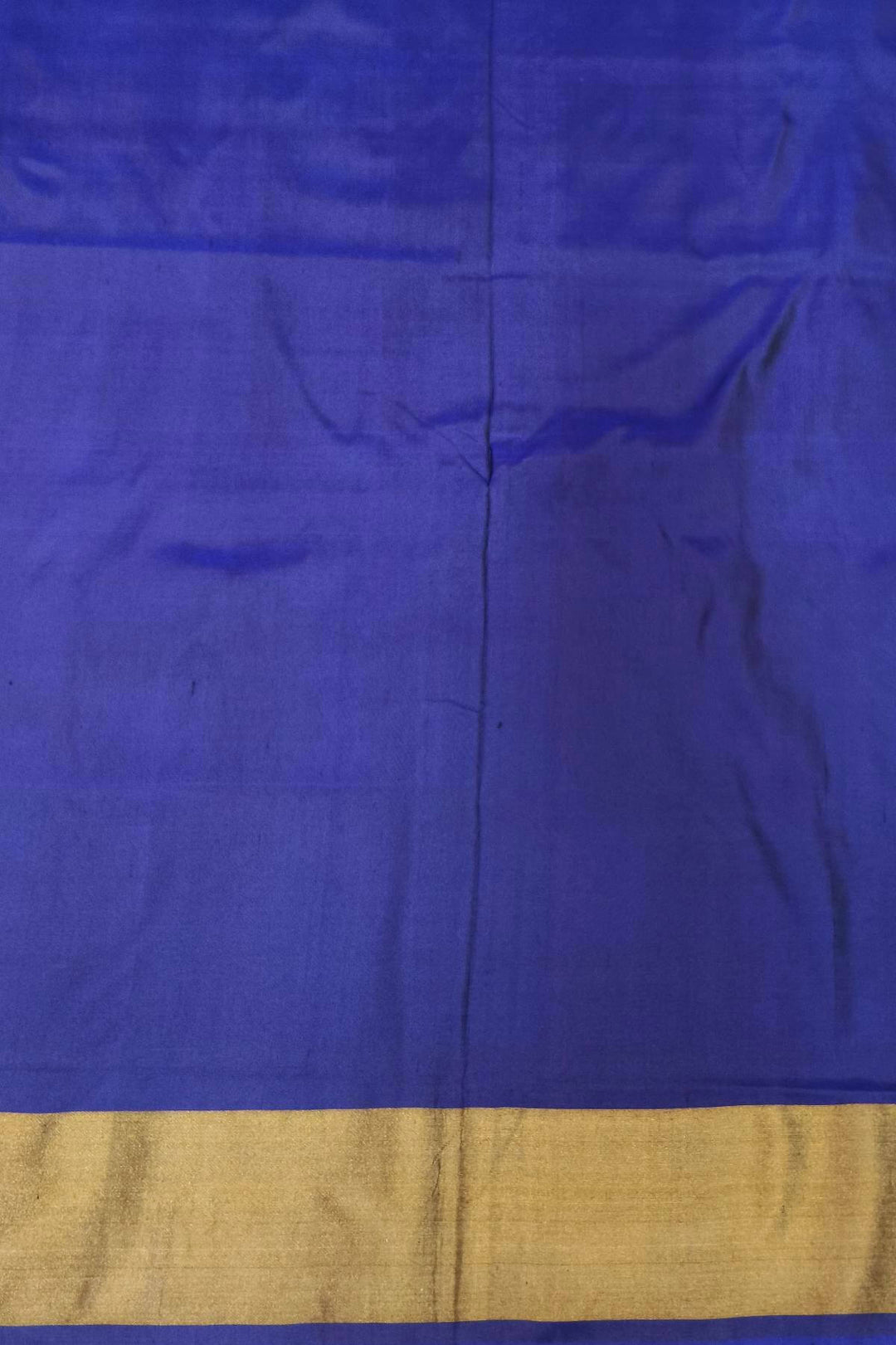 Handwoven Ikat pure silk saree in orange in wavy pattern