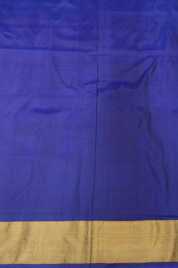 Handwoven Ikat pure silk saree in orange in wavy pattern