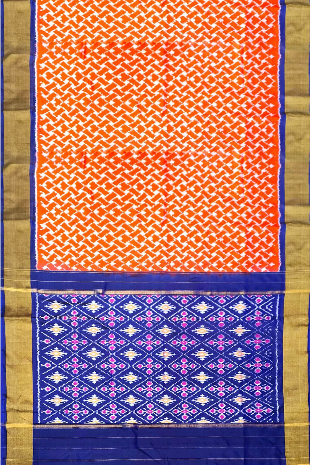 Handwoven Ikat pure silk saree in orange in wavy pattern