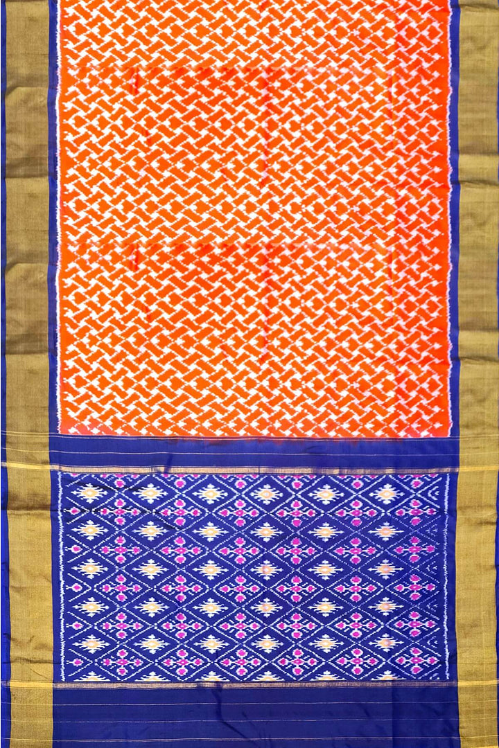 Handwoven Ikat pure silk saree in orange in wavy pattern