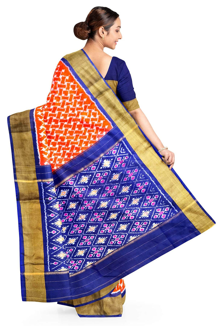 Handwoven Ikat pure silk saree in orange in wavy pattern