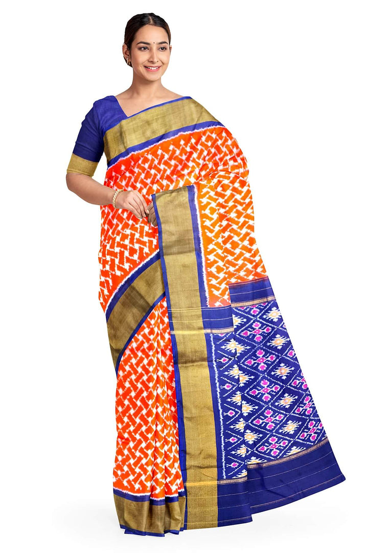 Handwoven Ikat pure silk saree in orange in wavy pattern