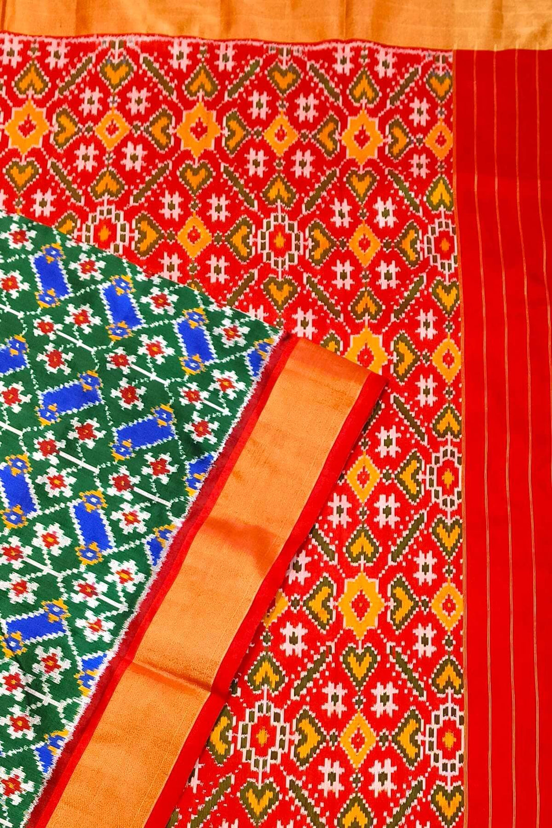 Handwoven Ikat pure silk saree in green & blue  in floral pattern