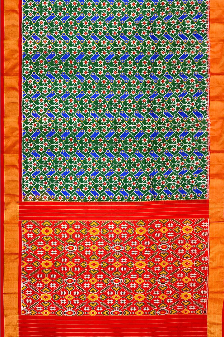 Handwoven Ikat pure silk saree in green & blue  in floral pattern