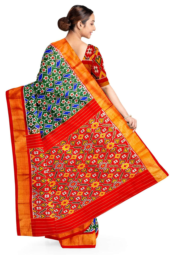 Handwoven Ikat pure silk saree in green & blue  in floral pattern