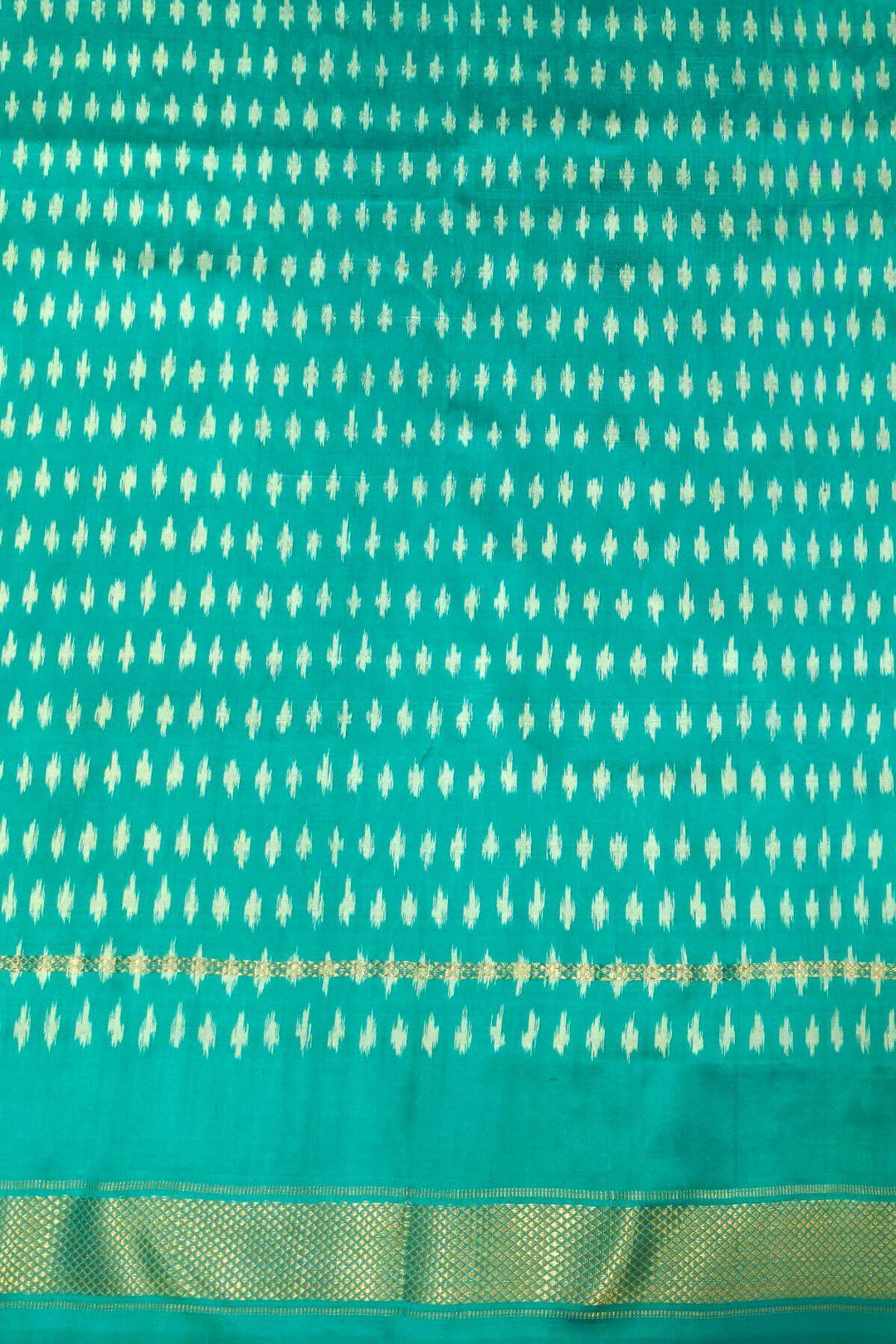 Handwoven ikat pure silk saree in grey in diagonal lines
