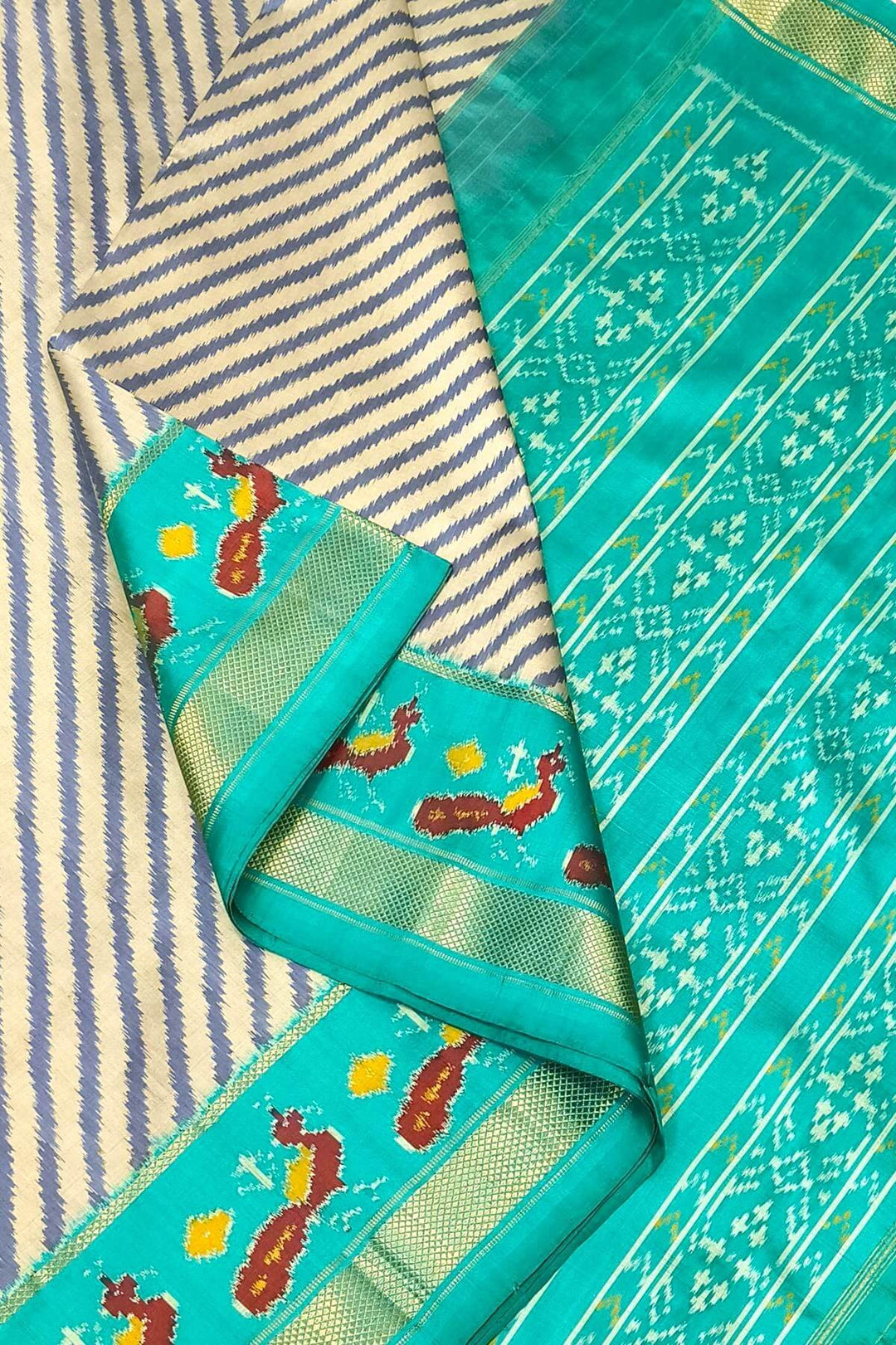Handwoven ikat pure silk saree in grey in diagonal lines
