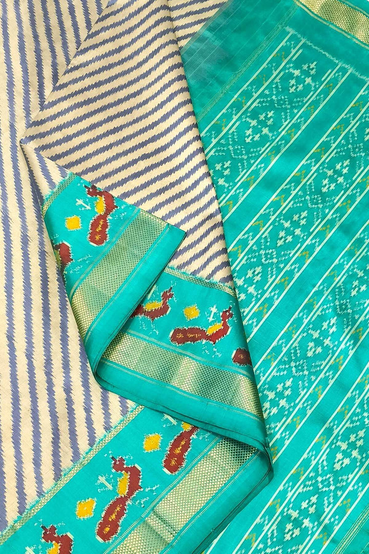 Handwoven ikat pure silk saree in grey in diagonal lines