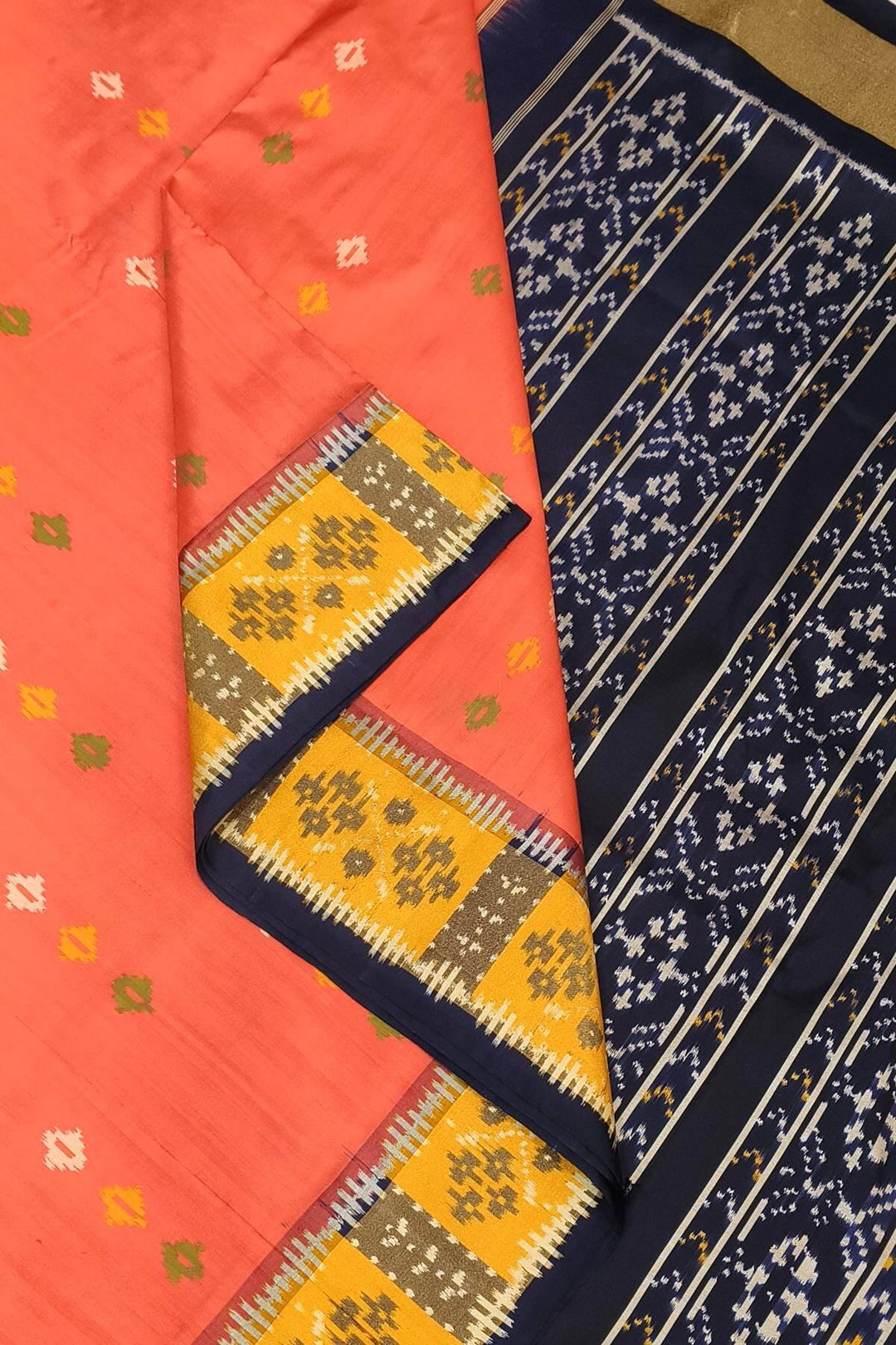 Ikkat pure silk saree in peach with coloured motifs