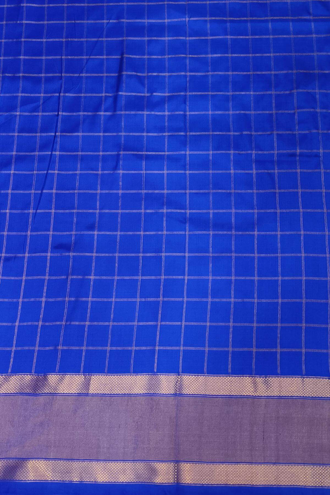 Ikkat pure silk saree in blue in geometric pattern