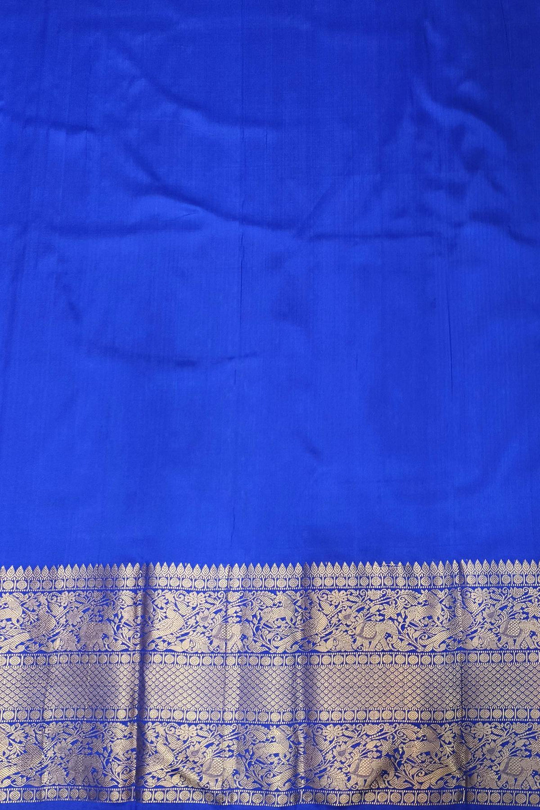 Ikkat  pure silk saree in blue in navratan pattern