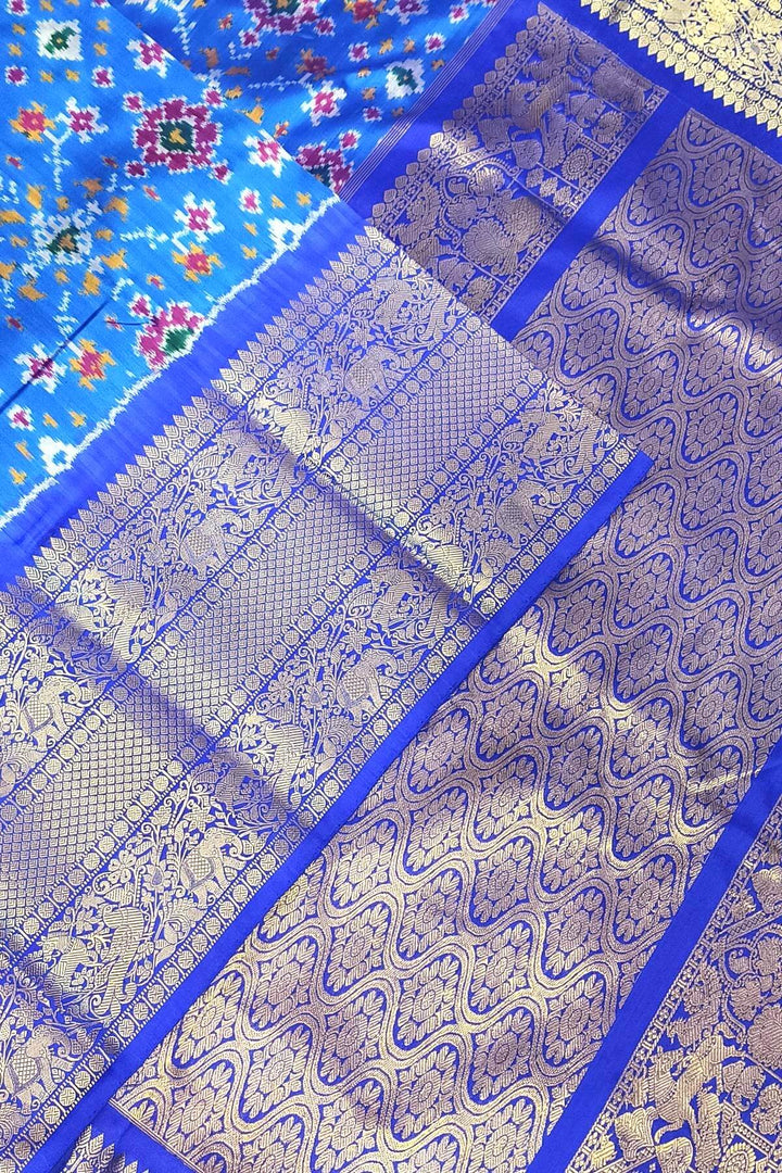 Ikkat  pure silk saree in blue in navratan pattern