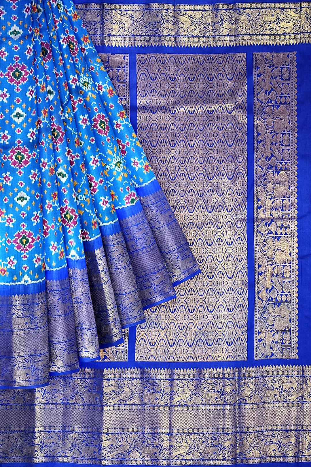 Ikkat  pure silk saree in blue in navratan pattern