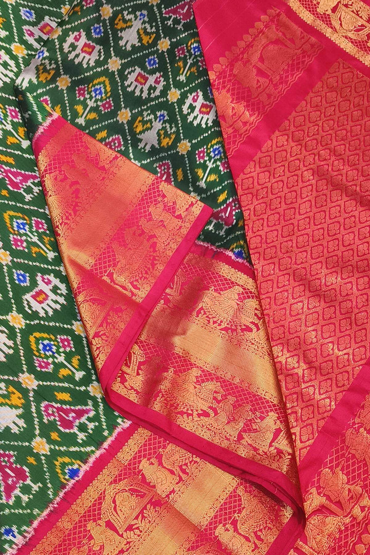 Ikkat pure silk saree in bottle green in narikunj pattern
