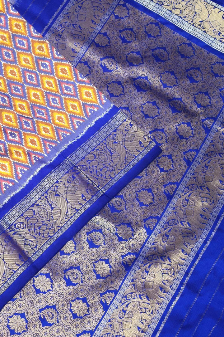 Ikkat pure silk saree in yellow & blue in diamond pattern