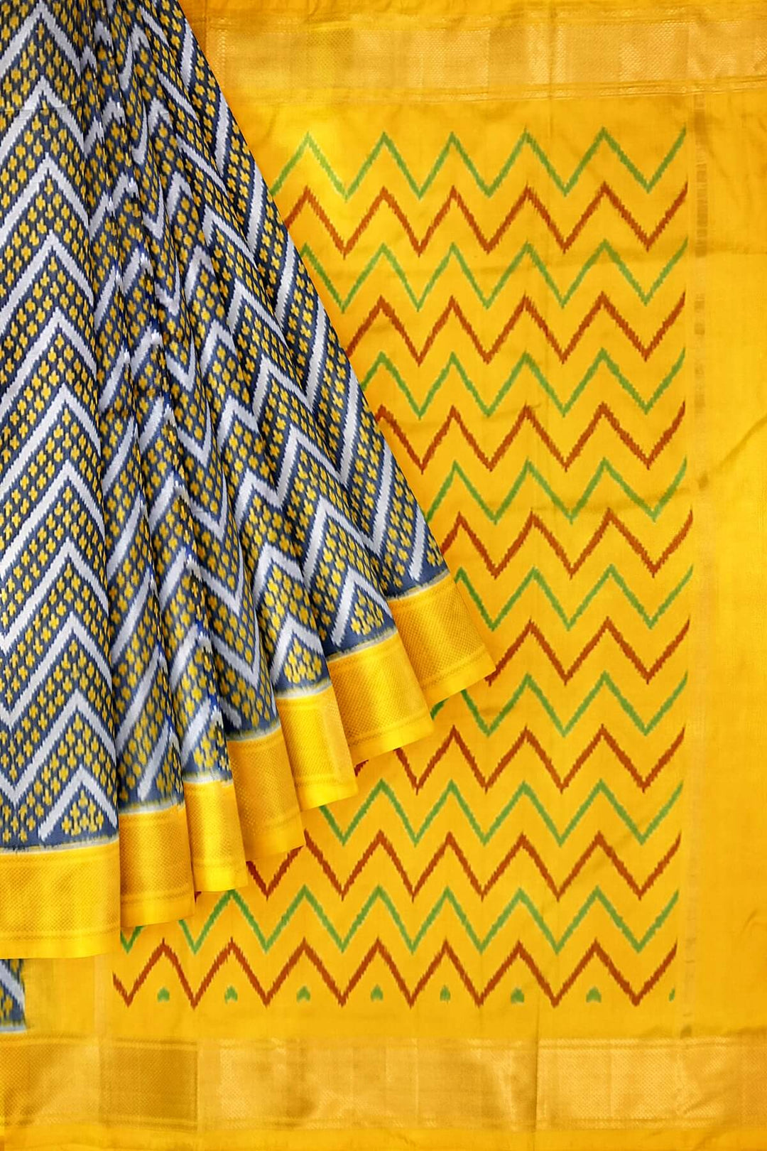 Ikkat pure silk saree in zig zag pattern in bluish grey