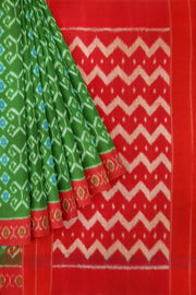 Handwoven ikat pure cotton saree in green with floral motifs