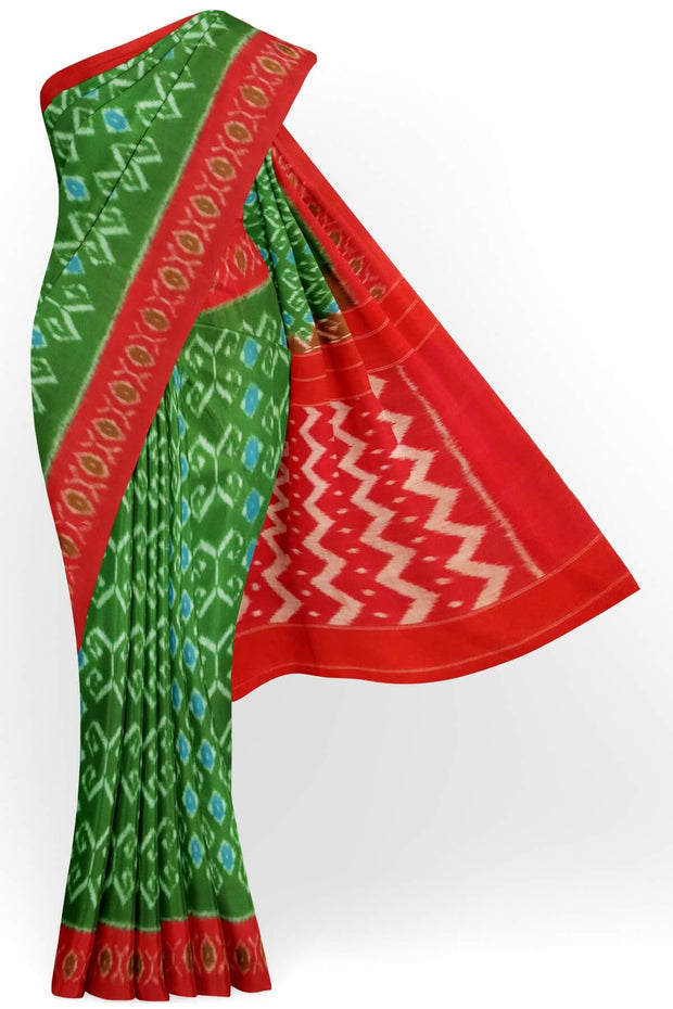 Handwoven ikat pure cotton saree in green with floral motifs