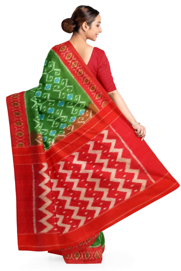 Handwoven ikat pure cotton saree in green with floral motifs