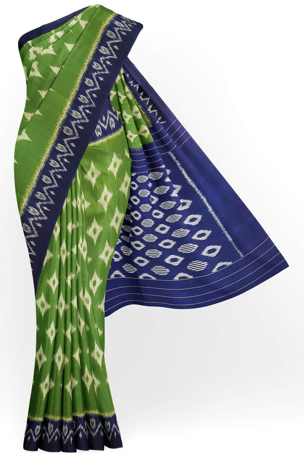 Handwoven ikat pure cotton saree  in dark green