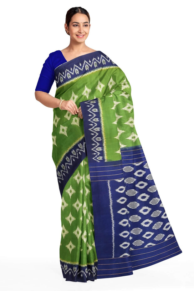 Handwoven ikat pure cotton saree  in dark green