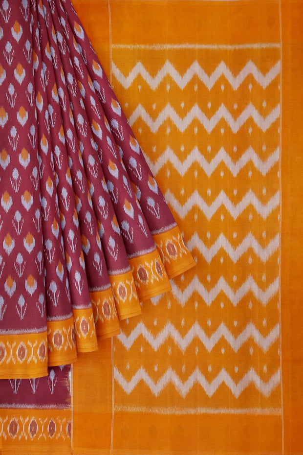 Handwoven ikat pure cotton saree in maroon with floral motifs