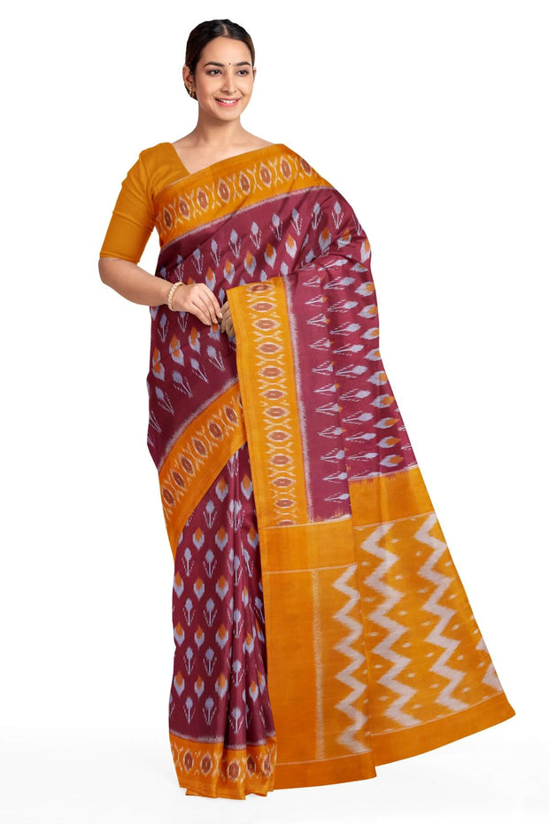 Handwoven ikat pure cotton saree in maroon with floral motifs