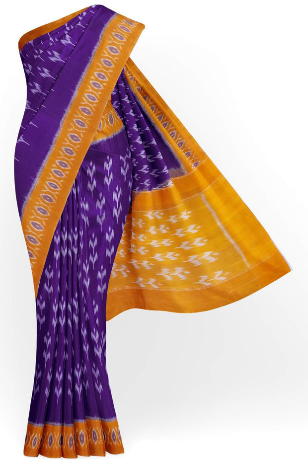 Handwoven ikat pure cotton saree in violet  with floral motifs .