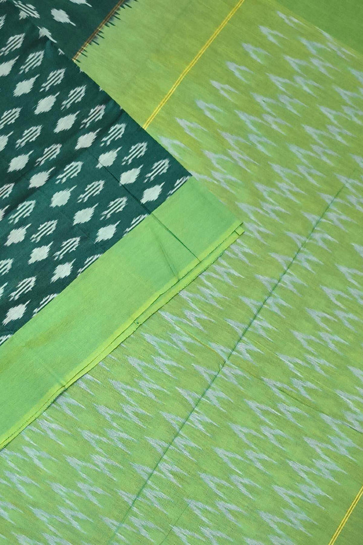 Ikkat pure cotton saree in bottle green