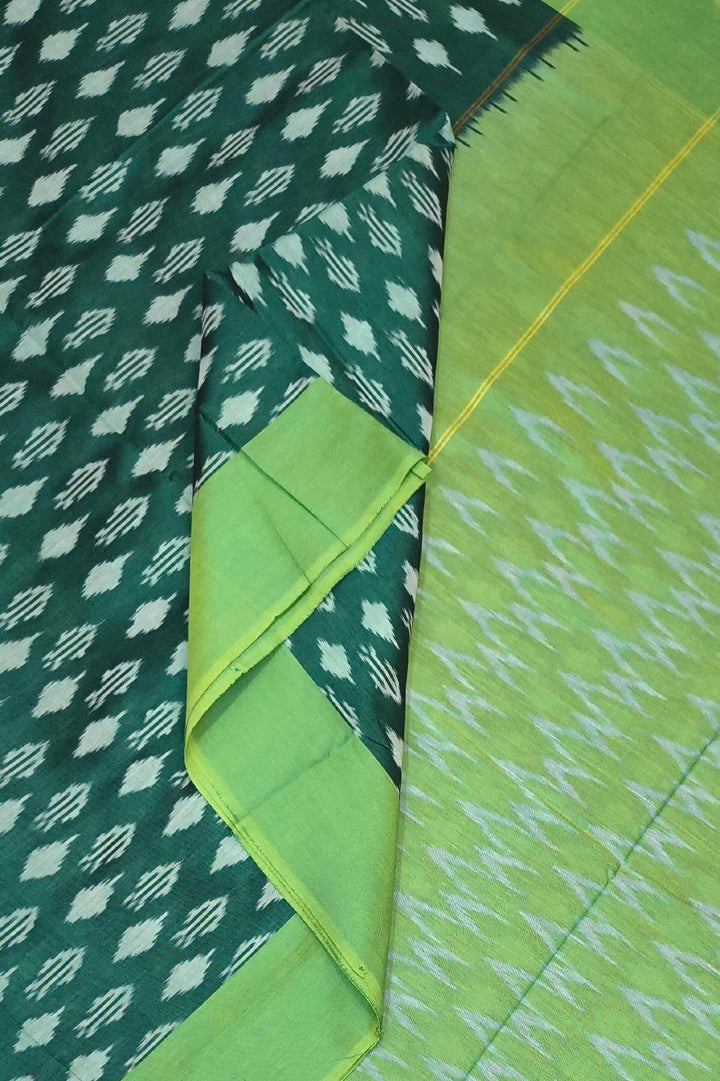 Ikkat pure cotton saree in bottle green