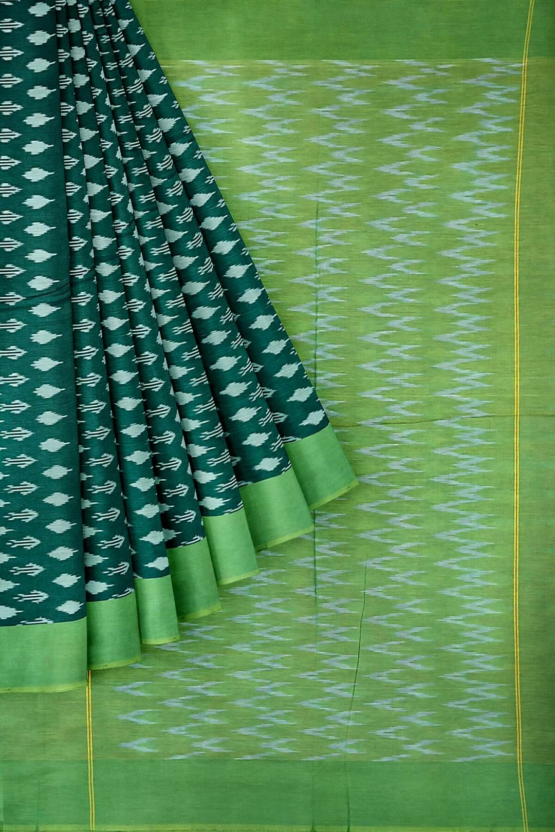 Ikkat pure cotton saree in bottle green