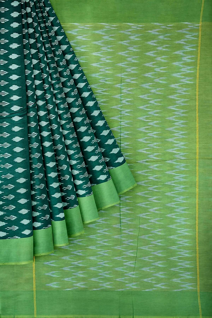 Ikkat pure cotton saree in bottle green