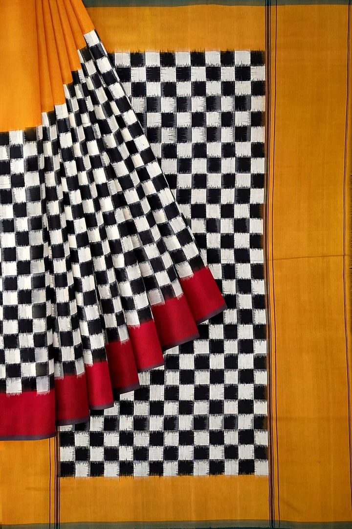 Handwoven double ikkat pure cotton saree in  mustard