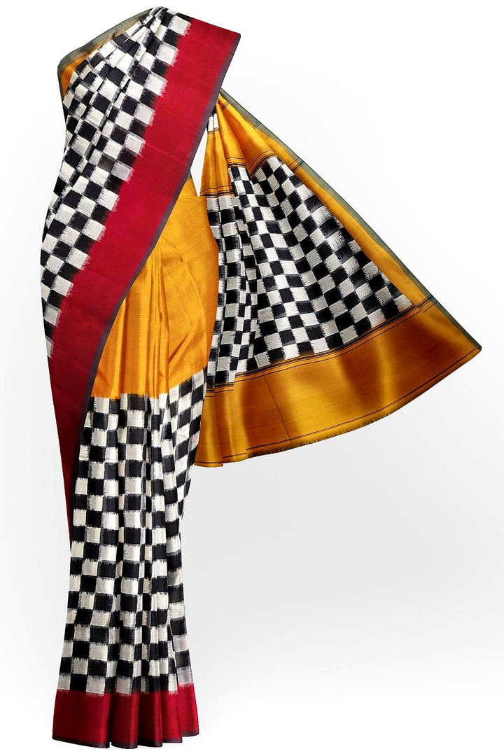 Handwoven double ikkat pure cotton saree in  mustard