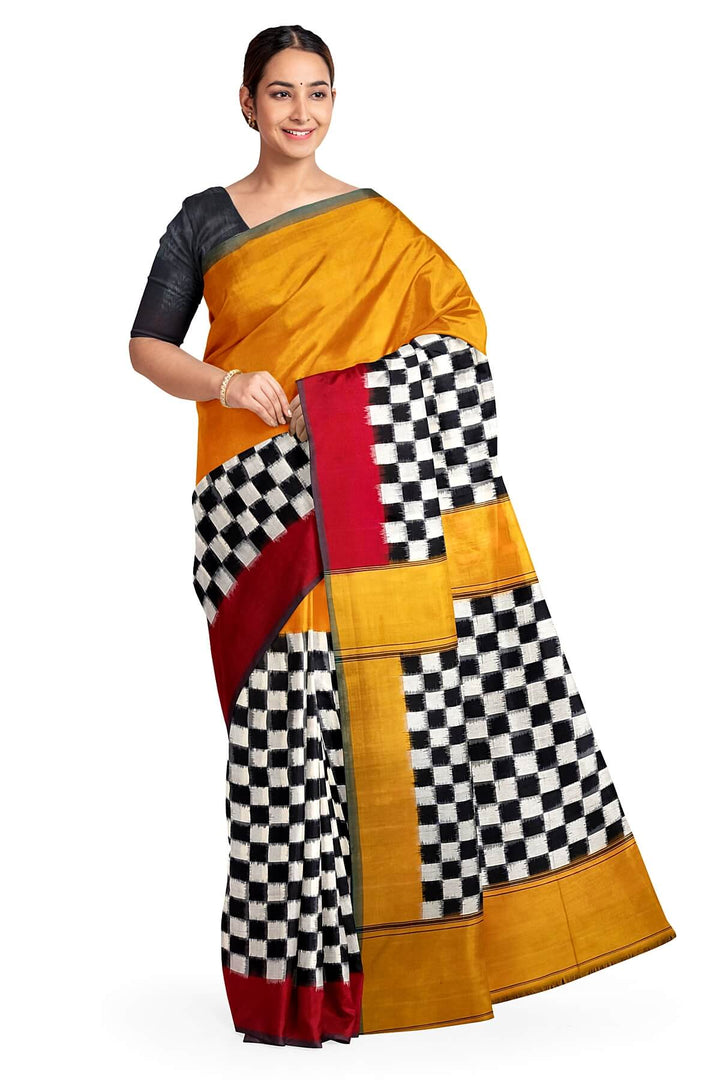Handwoven double ikkat pure cotton saree in  mustard